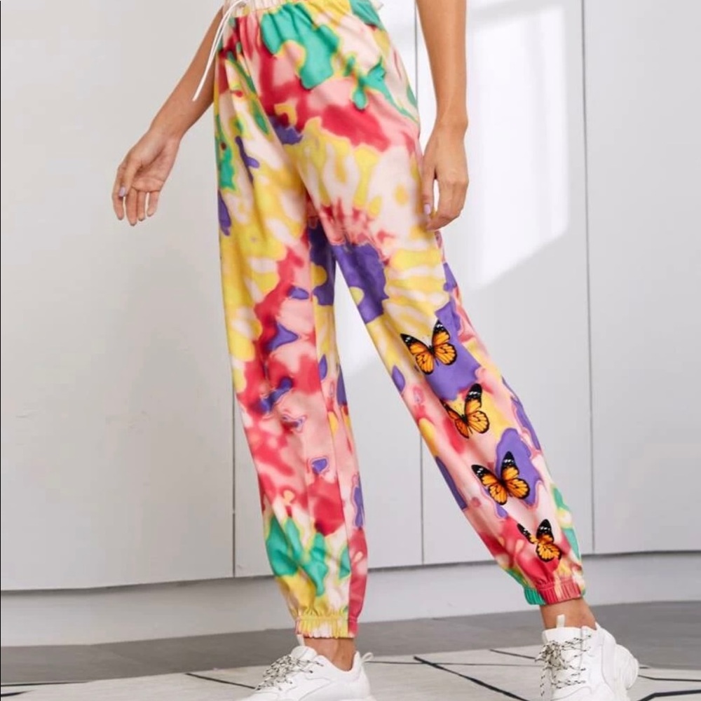 Tye dye sweatpants with orange butterflies